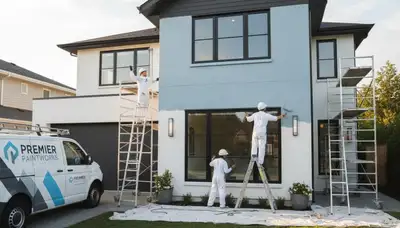 Professional exterior house painters applying weather-resistant paint in Fort Wayne, IN