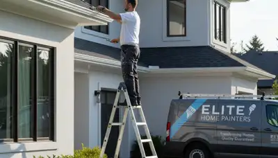 Professional gutter painting on residential home in Fort Wayne, IN by expert house painters