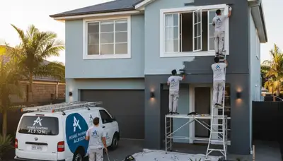 Professional house painters working on residential exterior in Fort Wayne IN
