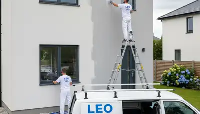 Professional house painters working on residential exterior in Fort Wayne IN