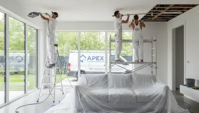 Professional popcorn ceiling removal by house painters in Fort Wayne, IN for smooth modern interiors