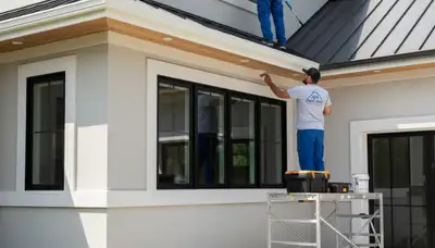 Professional trim and fascia painting on a Fort Wayne IN home by expert exterior house painters
